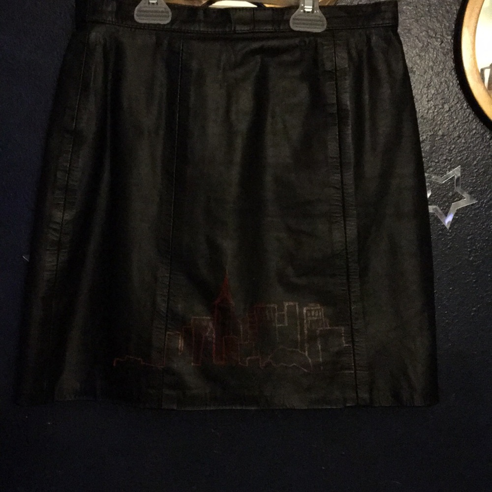 Leather skirt with hand-printed red skyline.